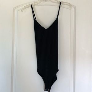 Black cross-strap bodysuit